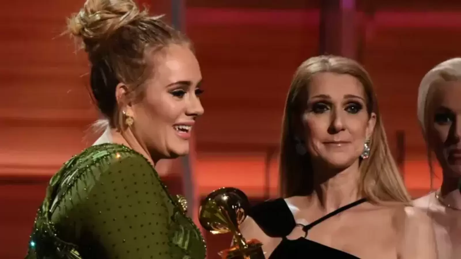 Adele bursts into tears as she shares emotional hug with Celine Dion. Watch